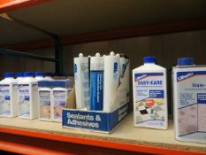 Shelf containing Lithofin Rust-Ex, Easy-Care, Stain-Stop, Outdoor-Cleaner, Wexa, Splash-Stop,