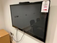 LG 50" flat screen wall mounted TV with remote control