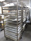 Four steel framed 15-shelf mobile bakers rack trolleys and assortment of trays