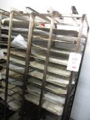 Four steel framed 15-shelf mobile bakers rack trolleys and assortment of trays