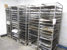 Five steel framed 15-shelf mobile bakers rack trolleys and assortment of trays