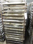 Four steel framed 15-shelf mobile bakers rack trolleys and assortment of trays