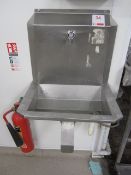 Stainless steel single basin knee-operated handwash unit and a stainless steel pedal-operated