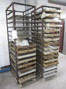 Two steel framed 16-shelf mobile bakers rack trolleys and assortment of trays