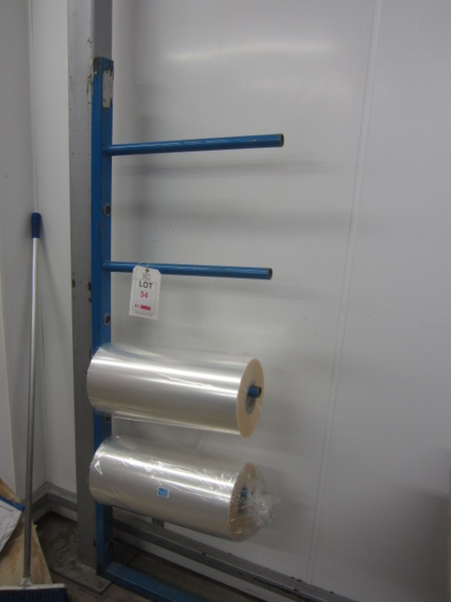 Four blue wall-mounted reel storage/dispenser racks (excludes reel stock)