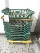 Two mobile transport trolleys and 10 plastic bread trays
