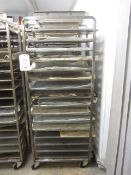 Four steel framed 15-shelf mobile bakers rack trolleys and assortment of trays