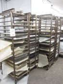 Four steel framed 15-shelf mobile bakers rack trolleys and assortment of trays