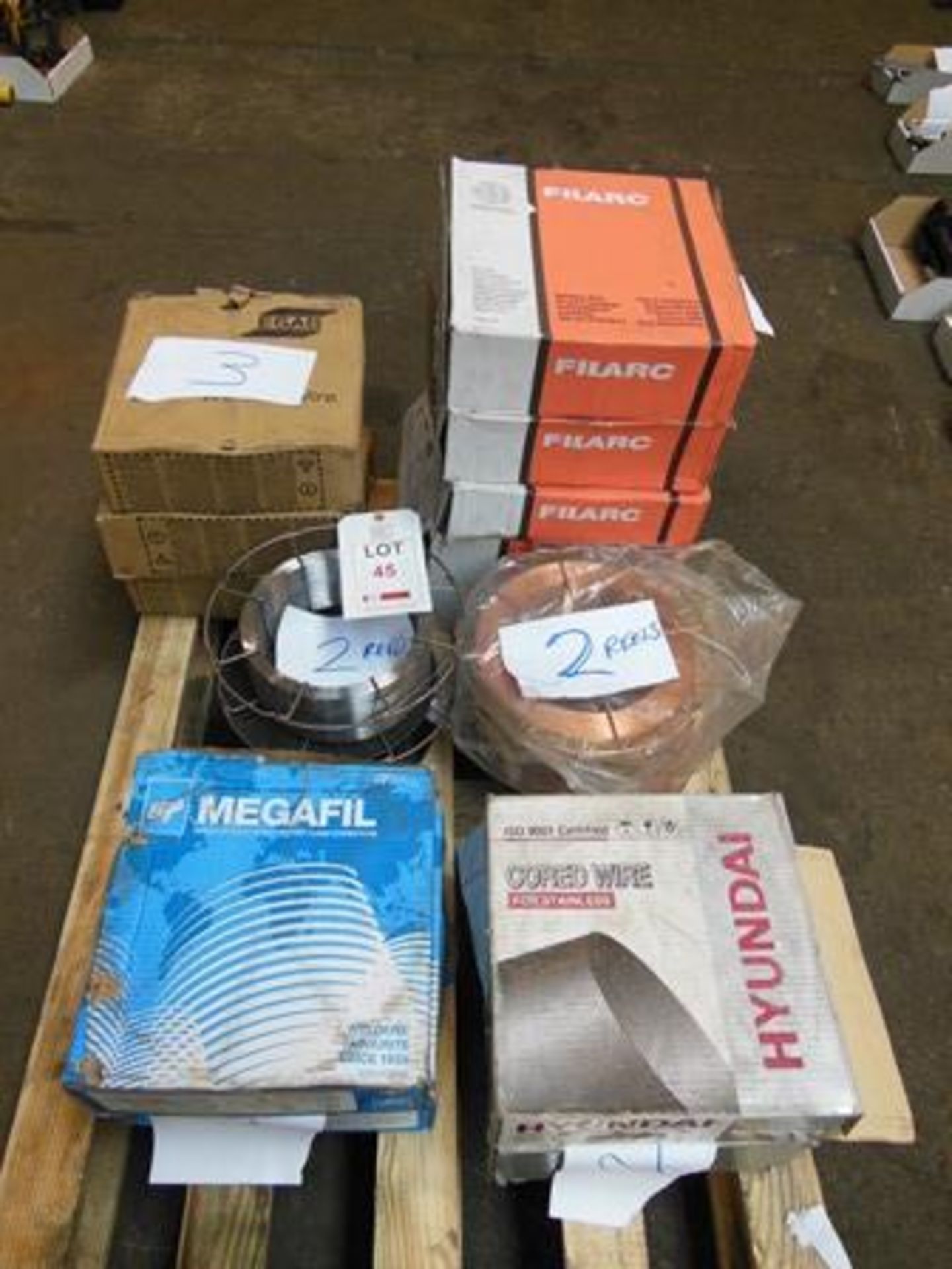 2 boxes of Hyundai cored welding wire for stainless, 2 boxes of Elga Megafil cored welding wire, 3