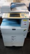 Ricoh Aficio MPC2550 photocopier with 4 boxes of A4 paper