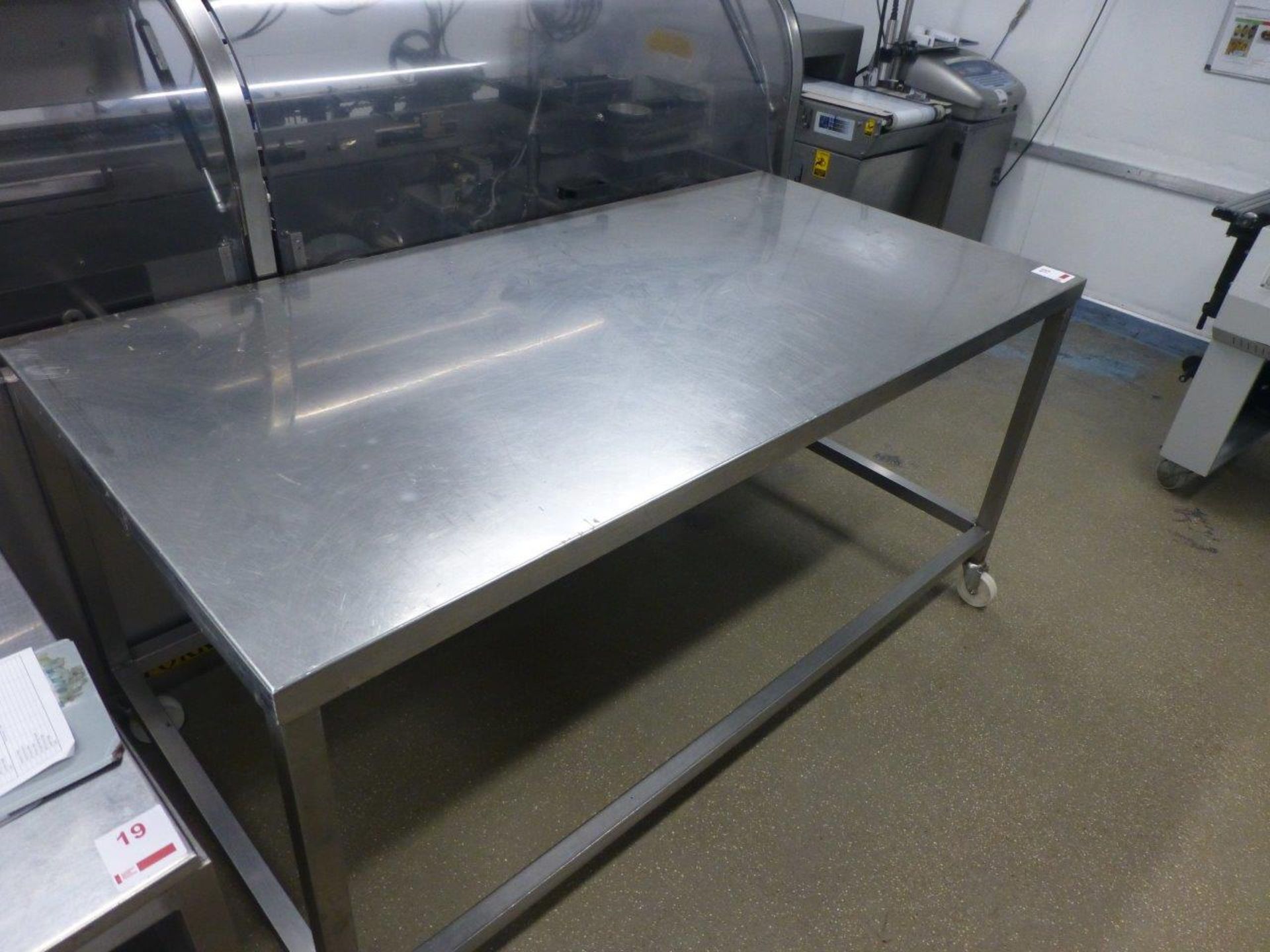 Stainless steel mobile food preparation table, 1800mm x 900mm x 890mm high