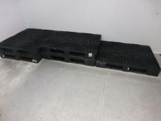 7 Black plastic pallets