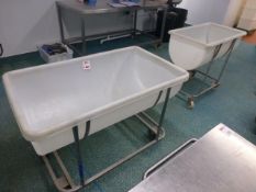 2 plastic mixing troughs on stainless steel trolleys