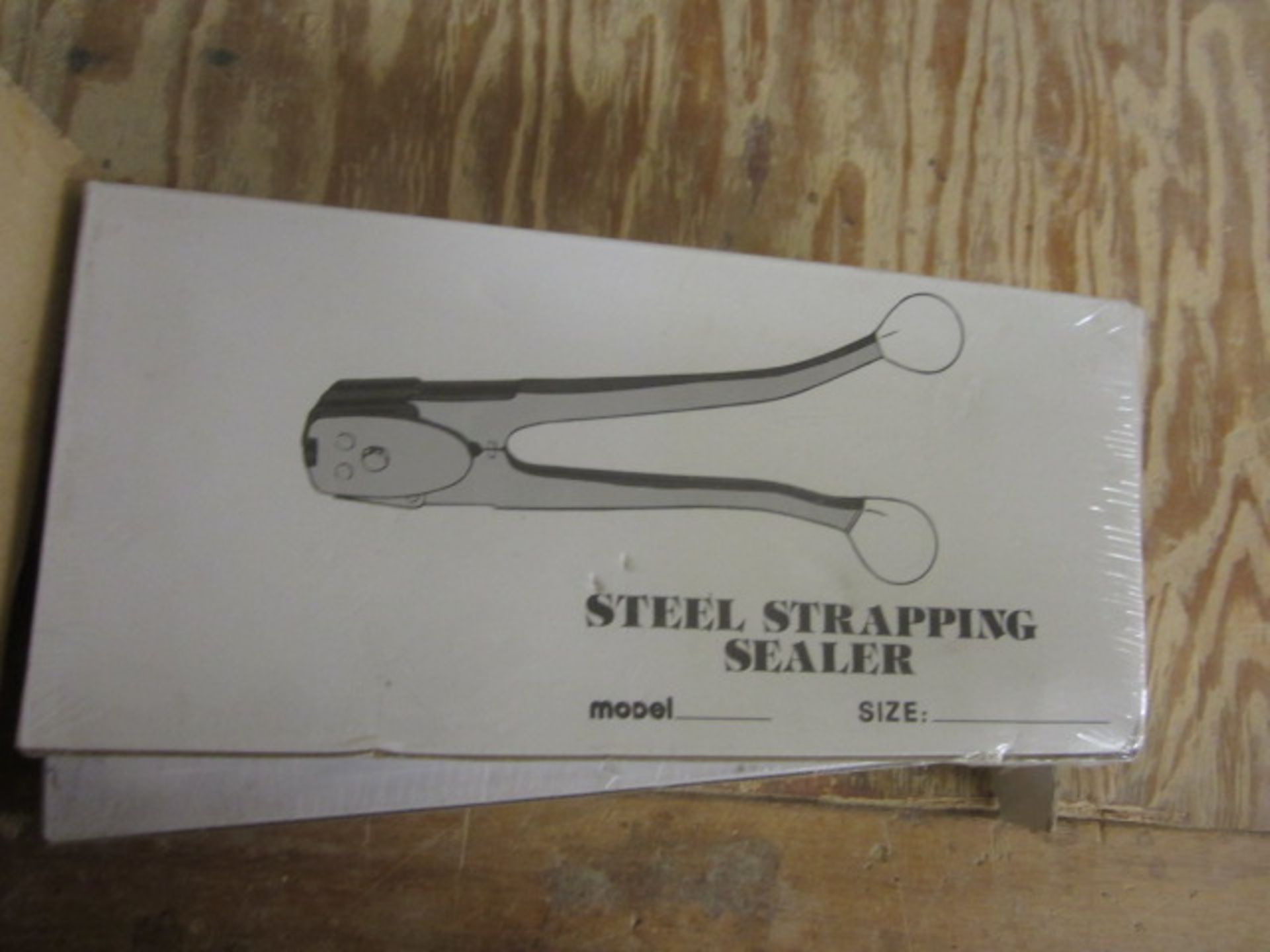 2 x steel strapping sealers with banding clips