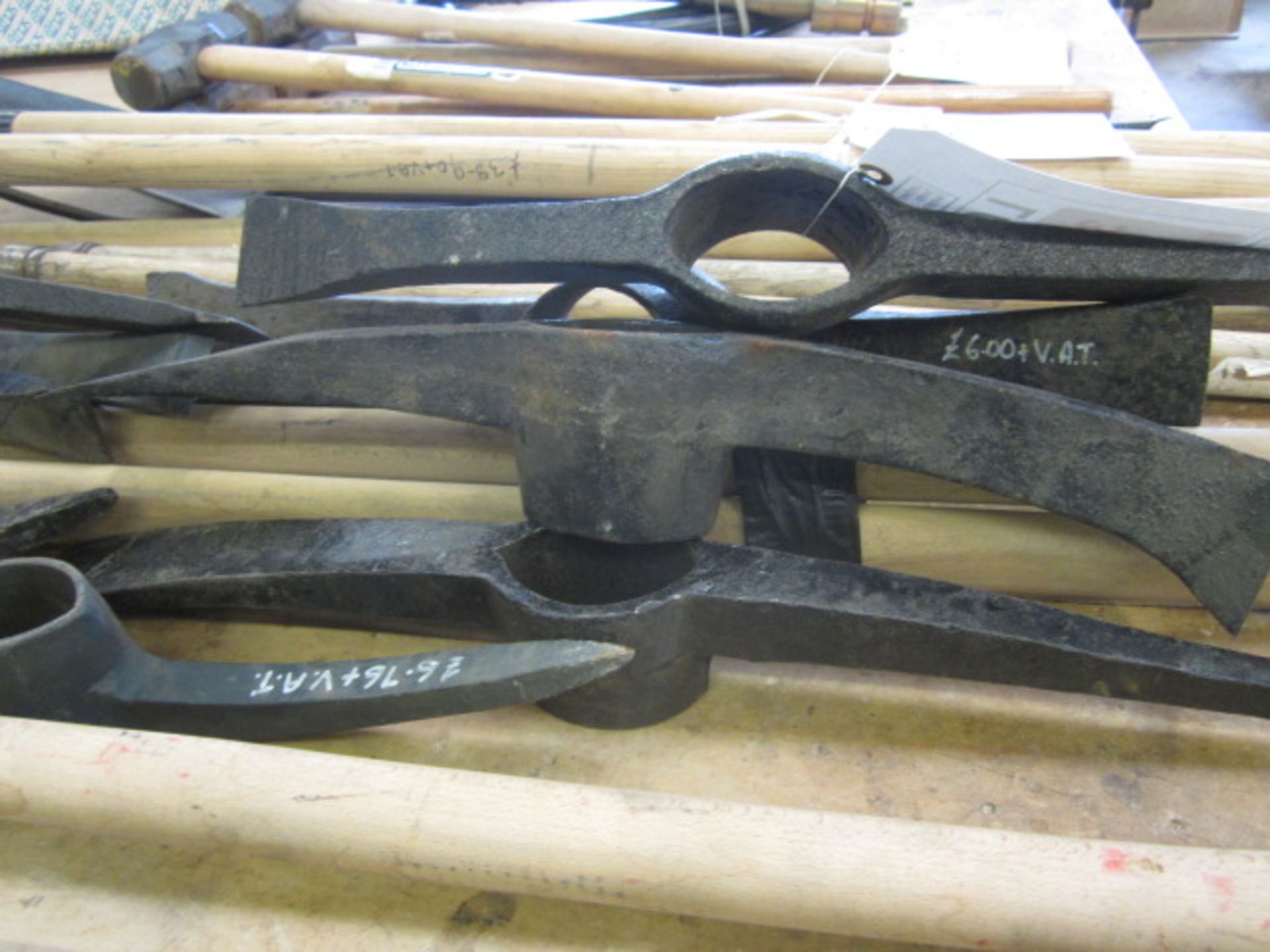 Quantity of assorted pick axe heads and handles, 4 x sledge hammers, posthole shovels, forks etc. - Image 2 of 4