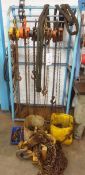 Seven various chain blocks, chains, strops, 'D' shackles, etc. (as lotted) with rack. NB: These