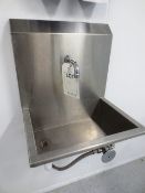 Stainless steel knee operated, wall mounted hand basin (Please note: This lot is subject to