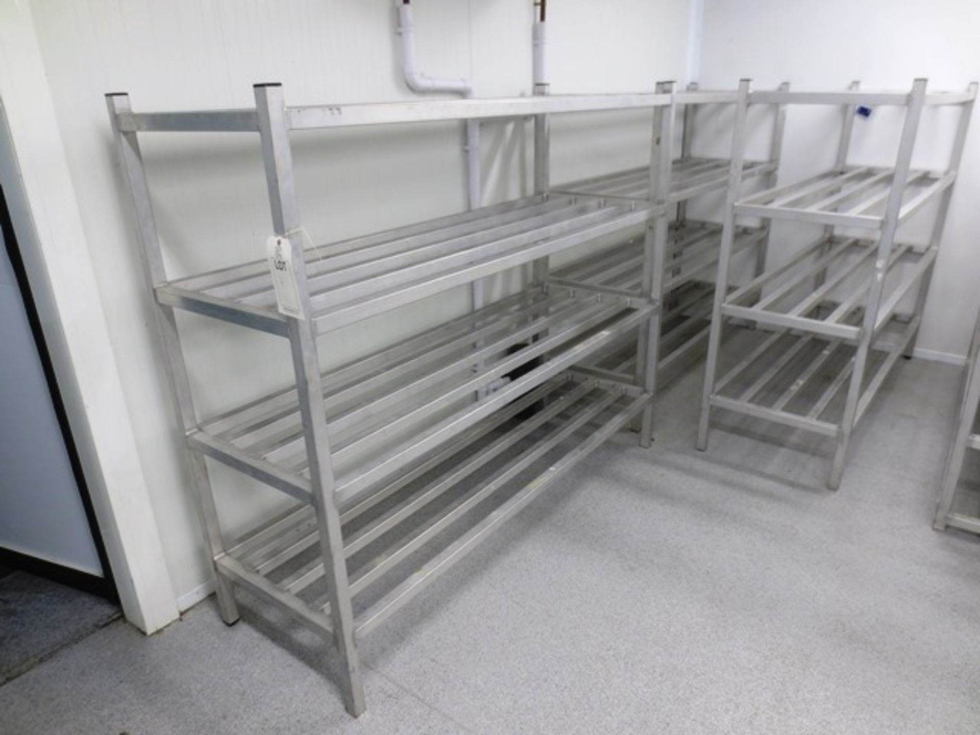 Three stainless steel storage racks, approx 72 x 23.5" each