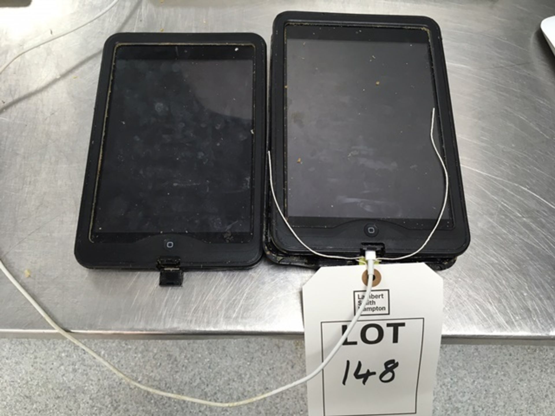 Two iPad Mini (Please note: only 1 x USB charger)