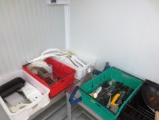 Contents of 5 plastic crates, to include assorted butchers knives, belts, saw, steel chain aprons,