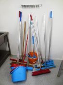 Quantity of commercial brooms, mops, etc.