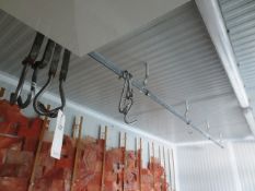 Two ceiling mounted hanging rails and hooks, approx 2.5m length (Please note: A work Method