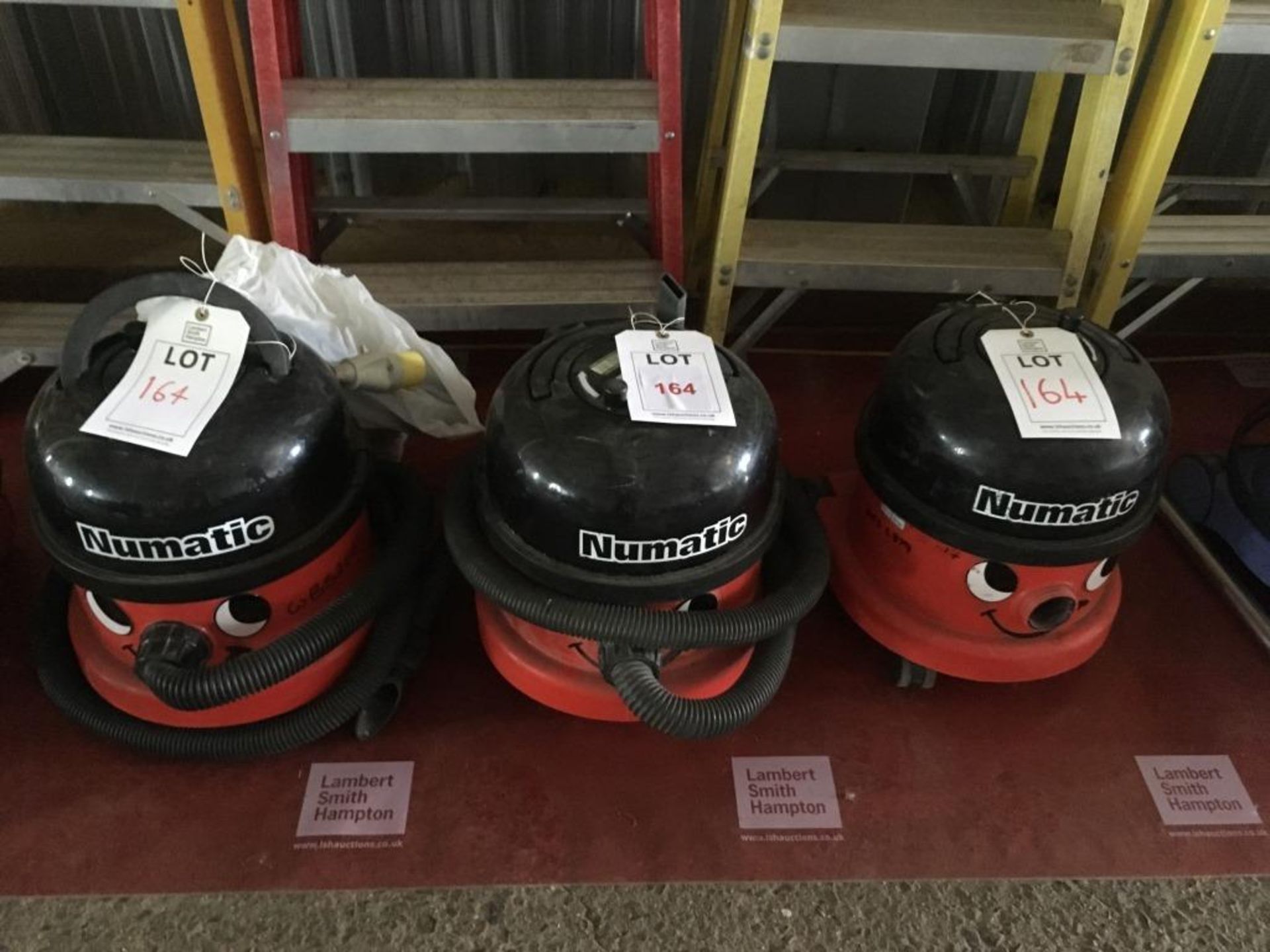 Three Numatic vacuum cleaners