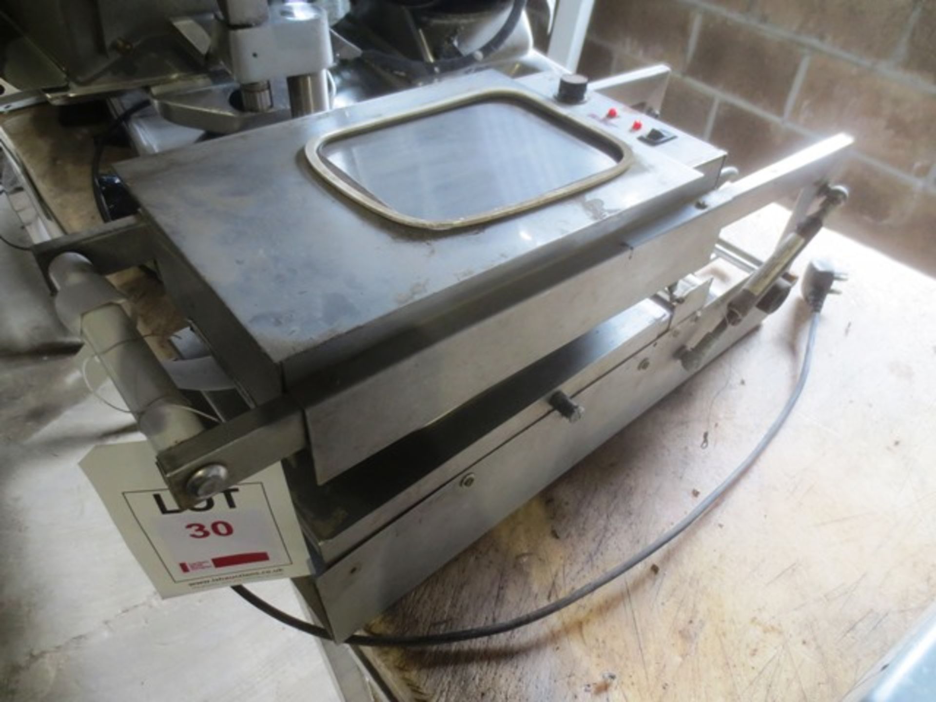 MK stainless steel bench top tray sealer, model Uni Lidder, serial no: UL4 314, 240v