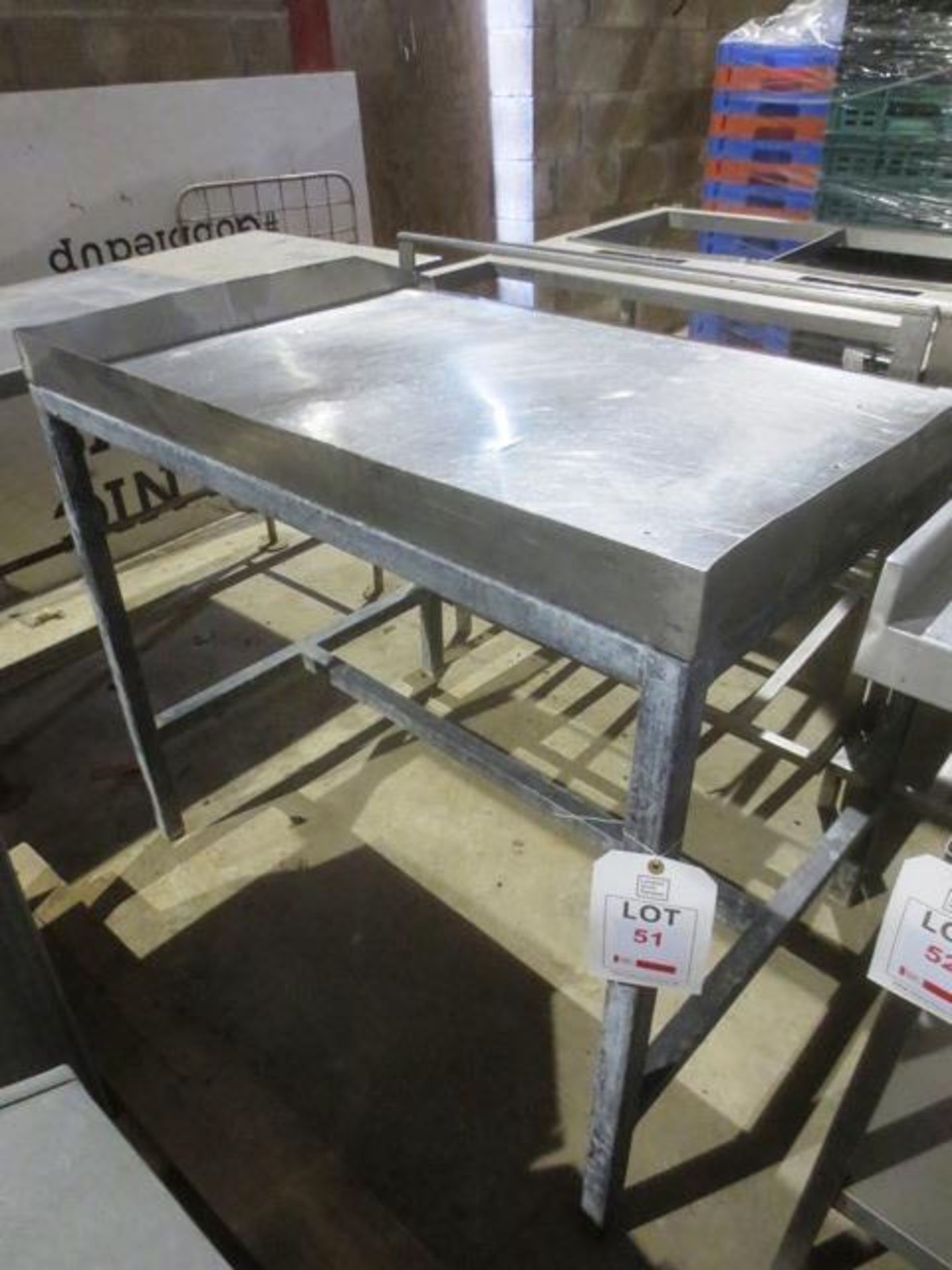 Two steel frame, stainless steel topped tables, approx 1060 x 780mm (please note: excludes all