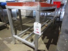 Stainless steel framed nylon topped cutting table, approx 1500 x 600mm, plus nylon block, approx