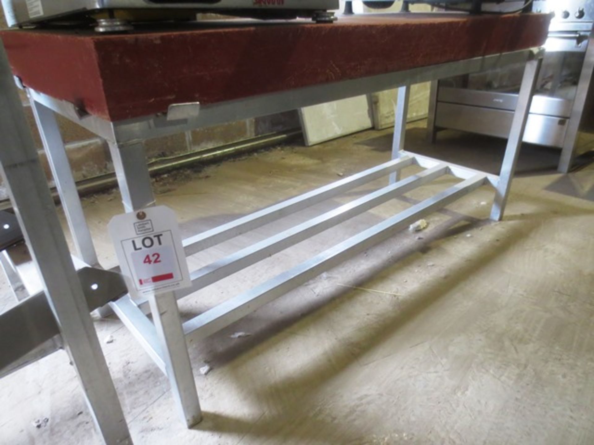 Stainless steel framed nylon butcher's block, approx 1500 x 600mm (please note: height 750mm) (