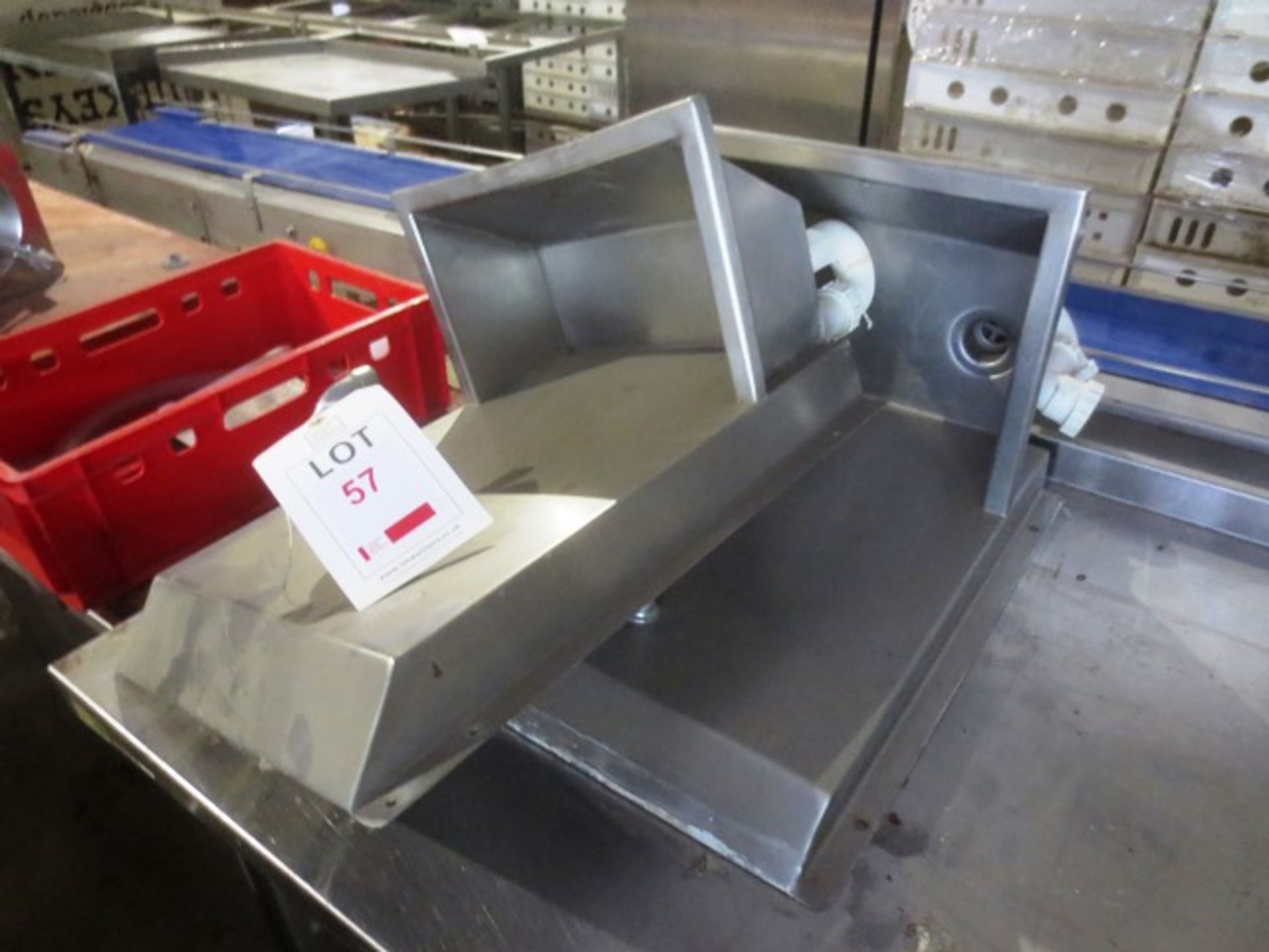 Two stainless steel, wall mountable sinks (please note: excludes all contents)