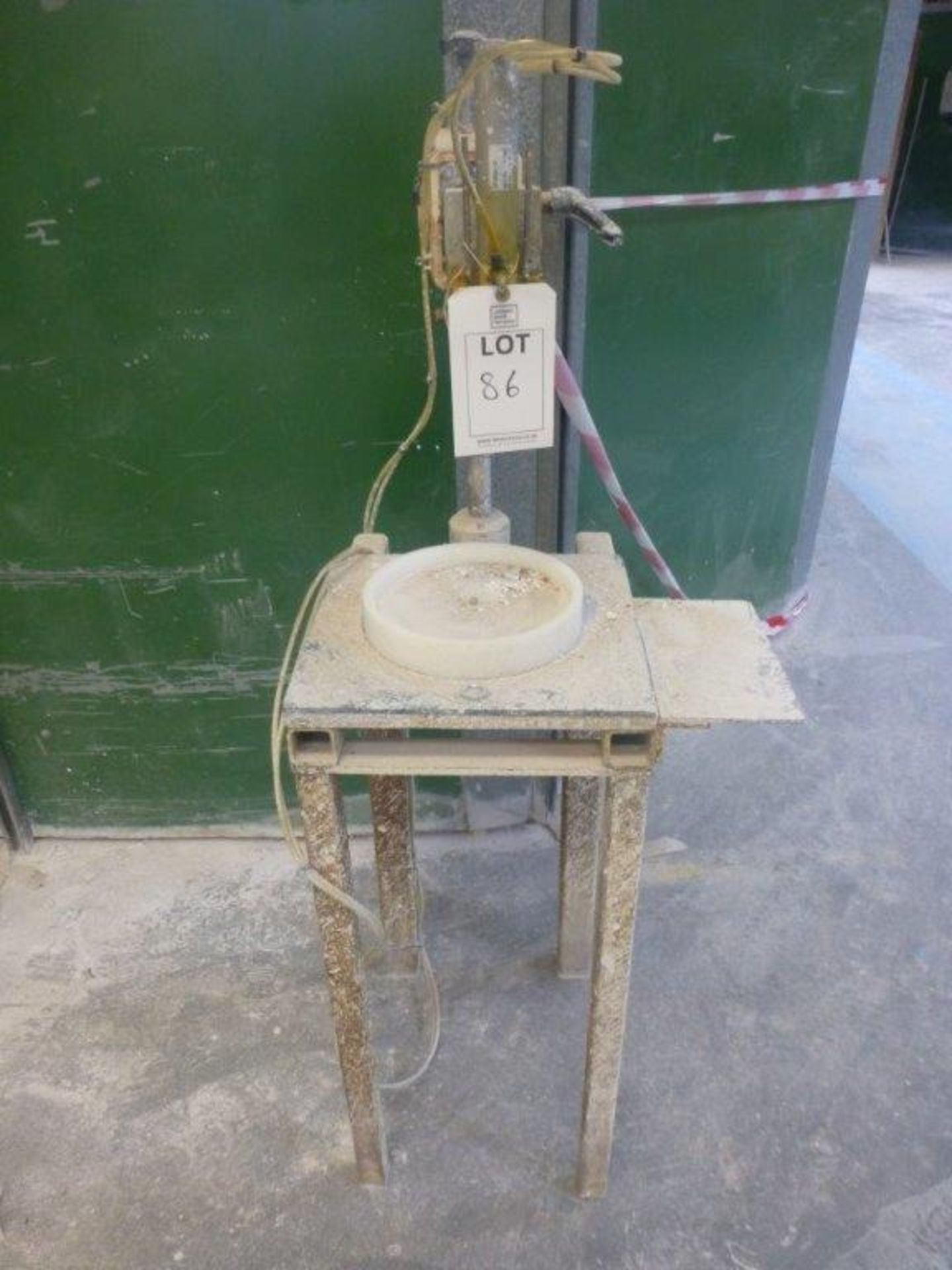 Stand mounted manual back stamper