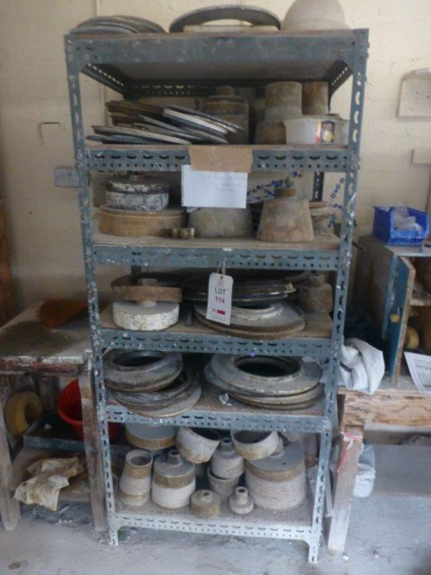 Quantity of Semi Dish chocks in and including 6 tier rack and steel double door cupboard