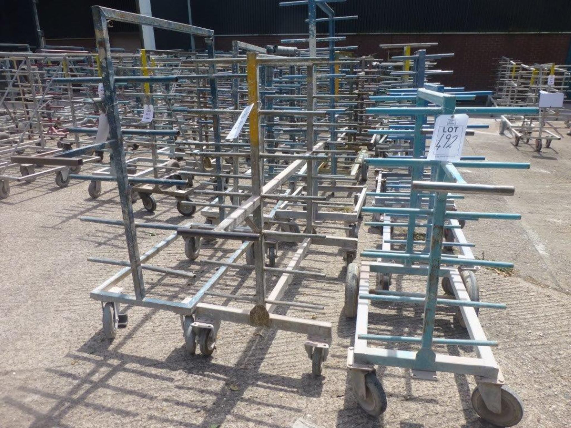 31 assorted multi-tier steel fabricated 4 wheel ware trolleys