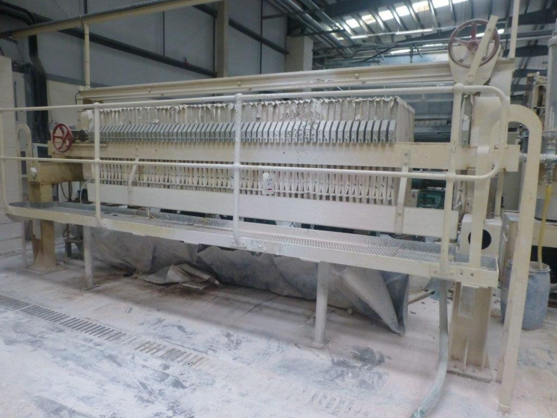 60 plate filter press, Plant No SHP6 Cream Press 1 overall length 5.6m with steel platform and