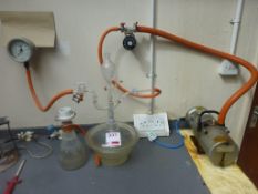 Benchtop vacuum desiccator and pump test rig