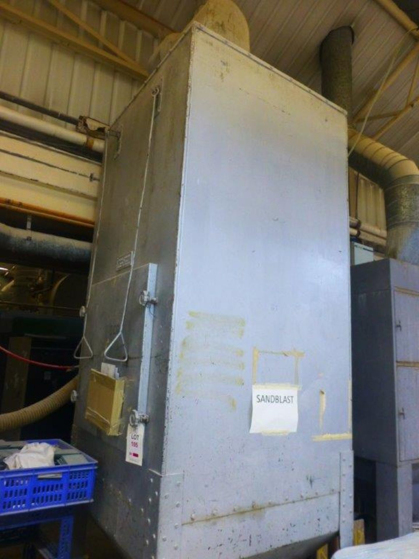 Potteries Ventilation & Heating freestanding dust collection unit with ducting to roof