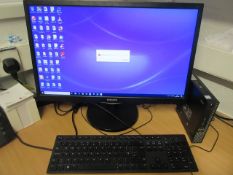 Dell Optiplex 3050 mini desktop computer with flat screen monitor, keyboard, mouse and 7th