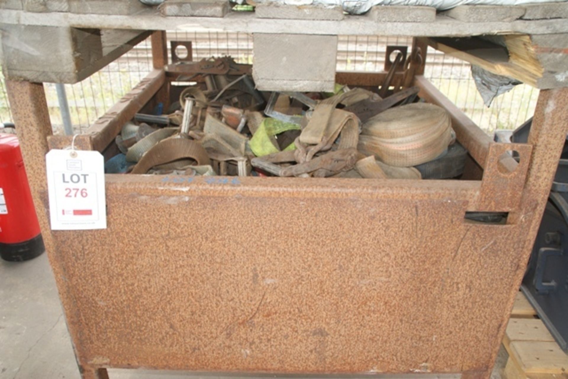 Stillage containing ratchet straps & chains as lotted