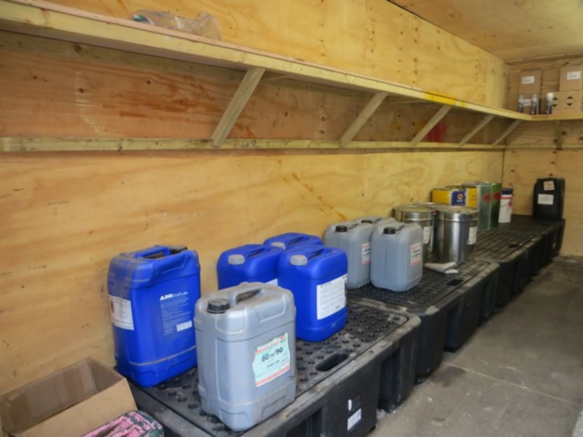 Contents of container to include unused oils & sprays complete with 8 bunded drip trays as lotted