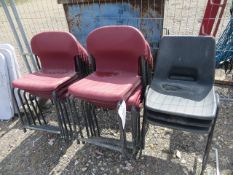Eleven Various Red Plastic Stacking Chairs & Three Blakc Plastic Stacking Chairs