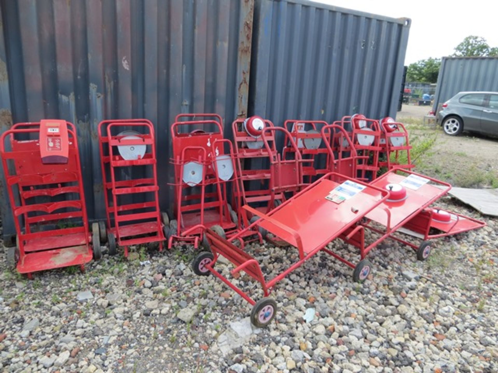 Twenty Three Various Mobile Extinguisher Trollies c/w Fire Bells as lotted