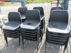 Thirty Five Various Black Plastic Stacking Chairs