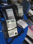 Four various NEC telephones