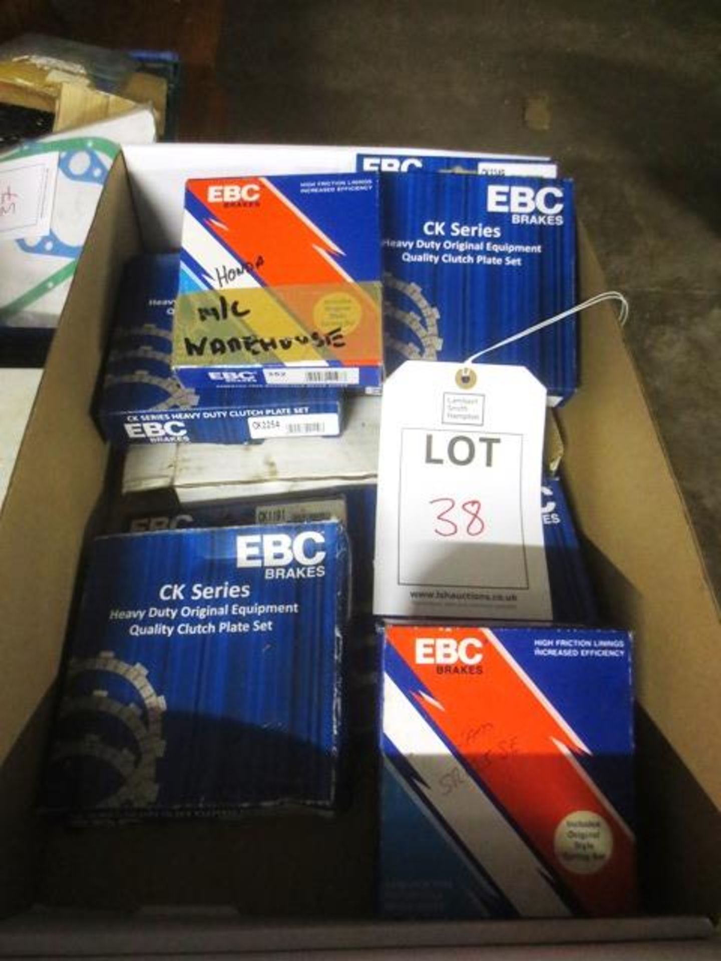 Box and contents to include assorted EBC brakes, clutch plates