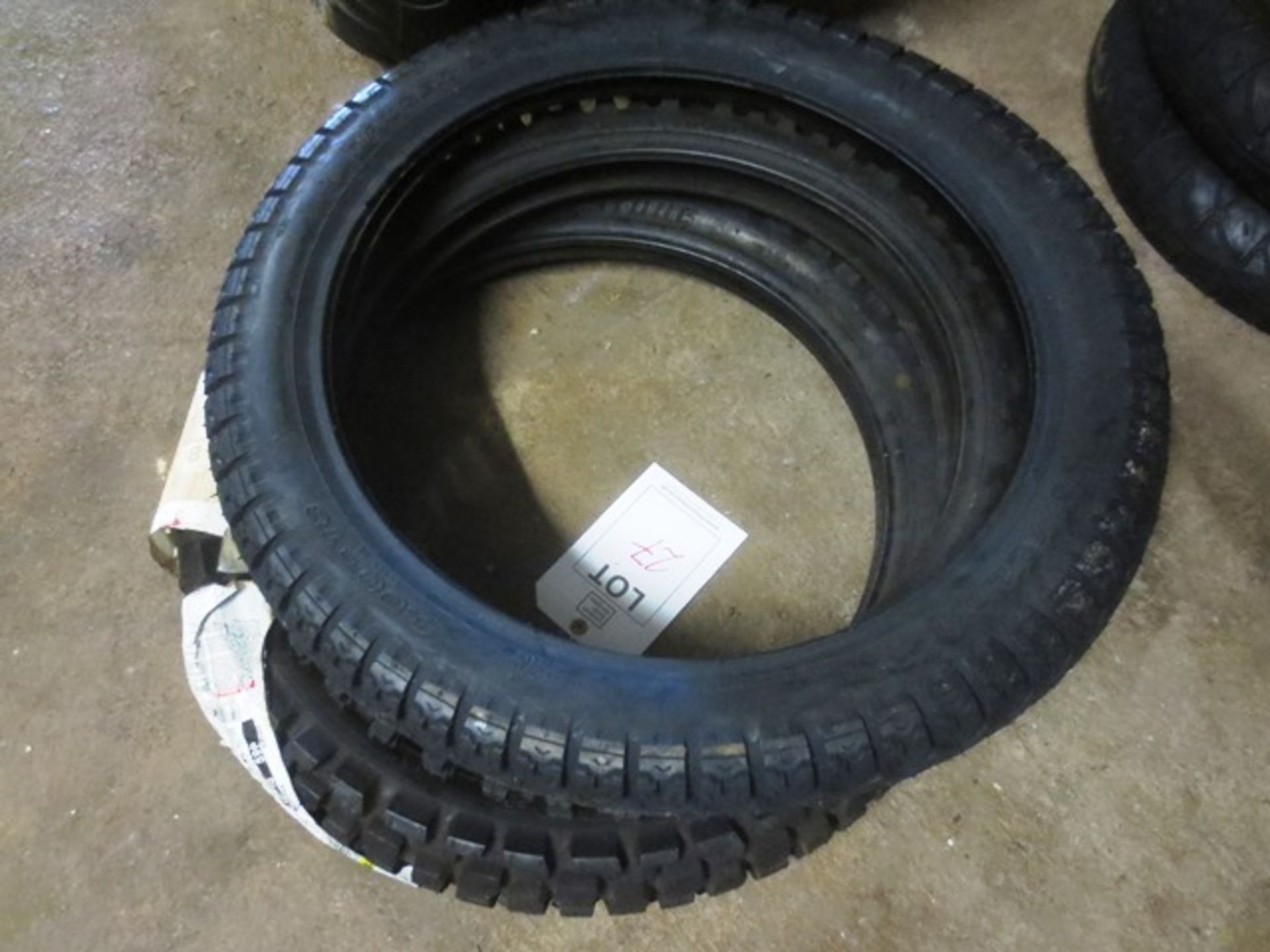 Three various motorcycle tyres, incl. Bridgestone, Tailwing TW302 4.10-18 59P, Crossfront 70-100-