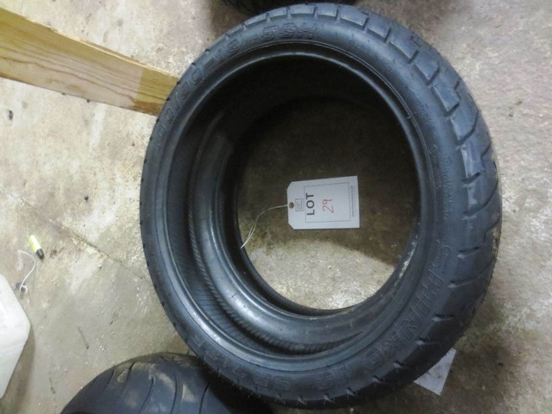 Two various motorcycle tyres, incl. Bridgestone 130-90-16 and Shinko 100-90-18