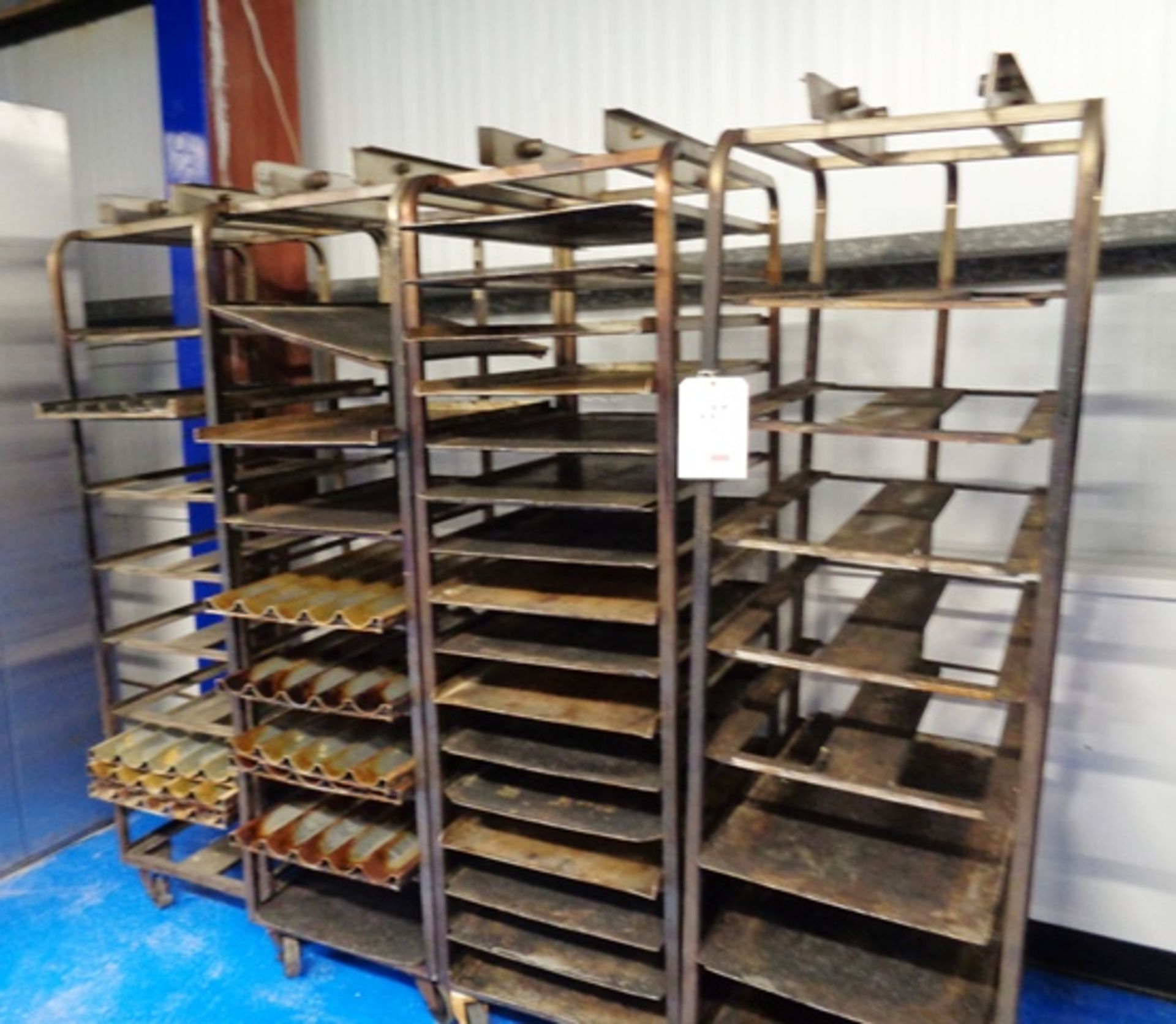 Four mobile multi-shelf rack oven trolleys. Approx 520 x 720 x 1850mm