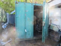 Green steel shipping container, 18 ft. x 8 ft. approx. plus rack and contents including steel